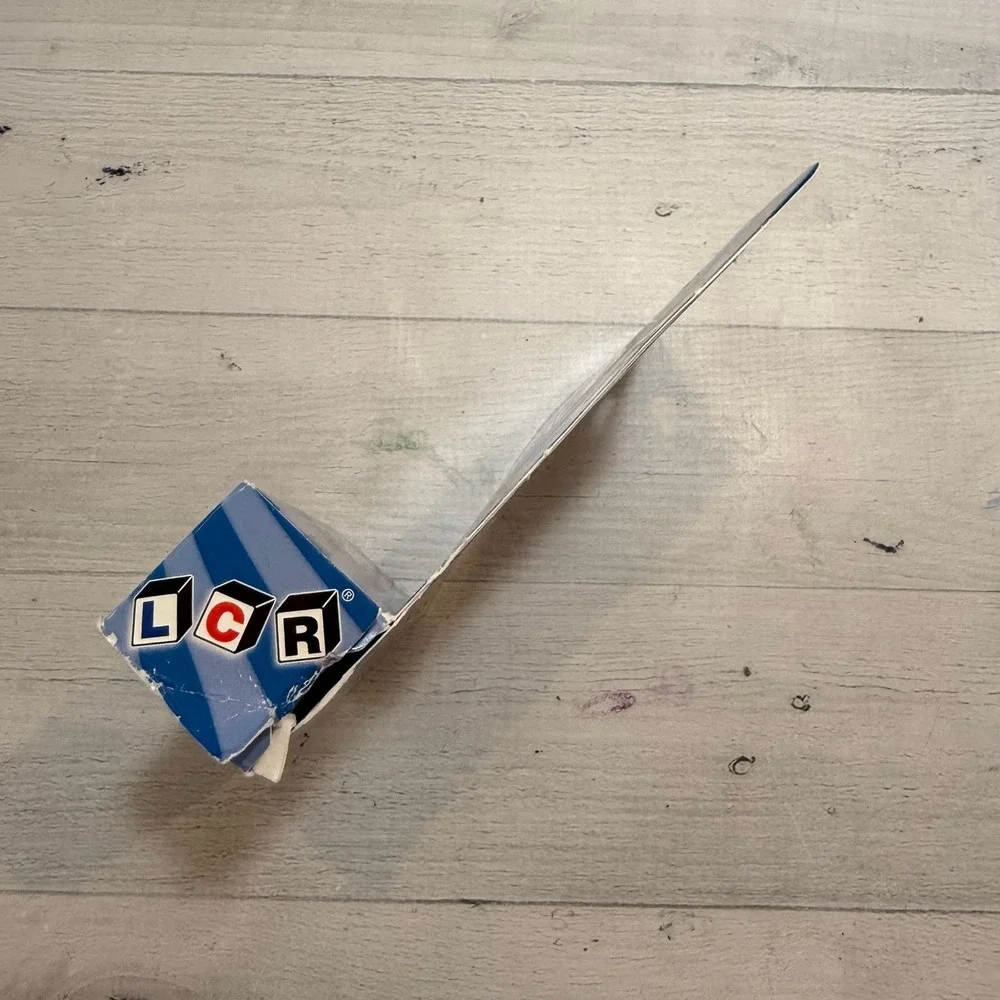 LCR‎ left center right dice game